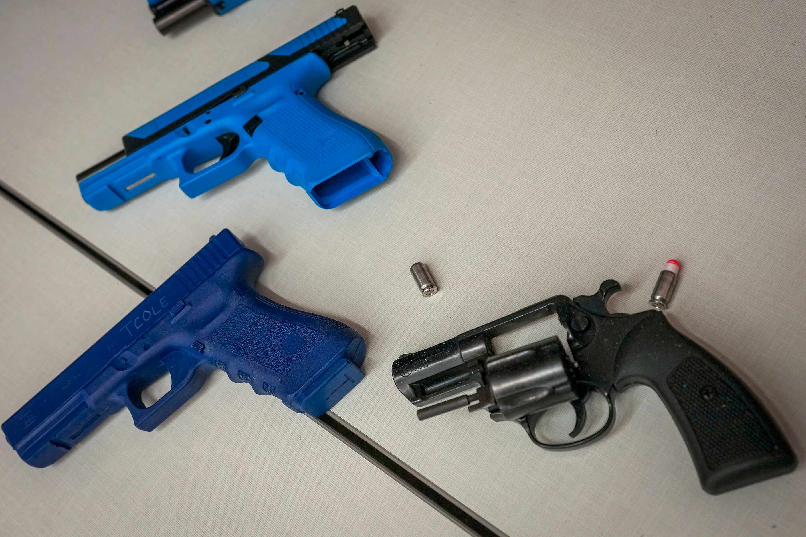 Training guns are seen during a school safety active shooter training demonstration...