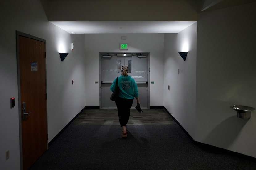 Cari-Ann Burgess, interim Registrar of Voters for Washoe County, Nev., leaves the office...