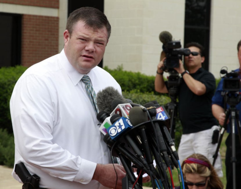 Police blocked off Blarney Stone Way near Forney, where Kaufman County District Attorney...