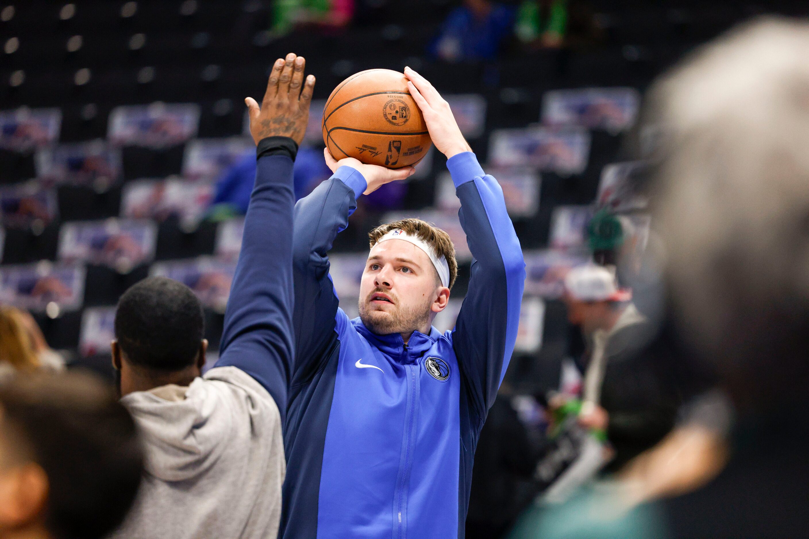 Dallas Mavericks guard Luka Doncic (77) shoots the ball during warmups before an NBA game...