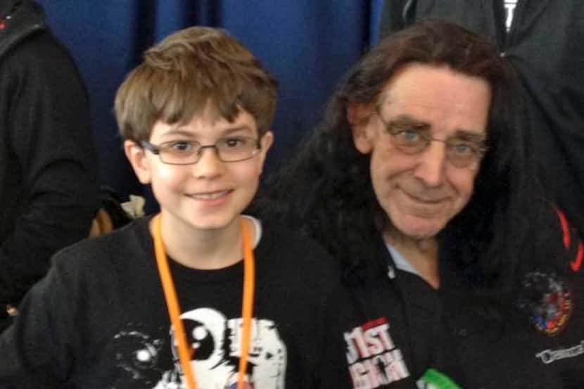
Conor met actor Peter Mayhew and had his picture taken with him.
