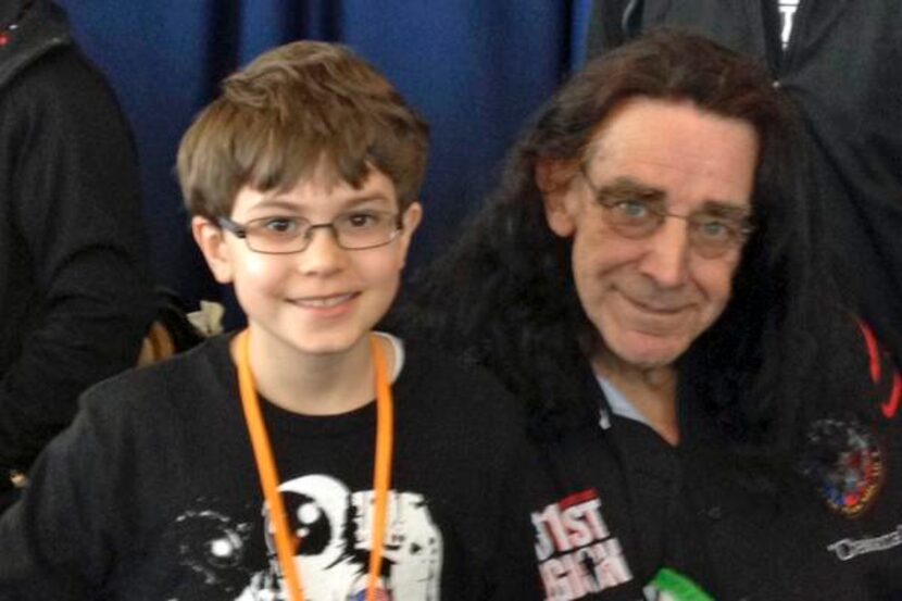 
Conor met actor Peter Mayhew and had his picture taken with him.
