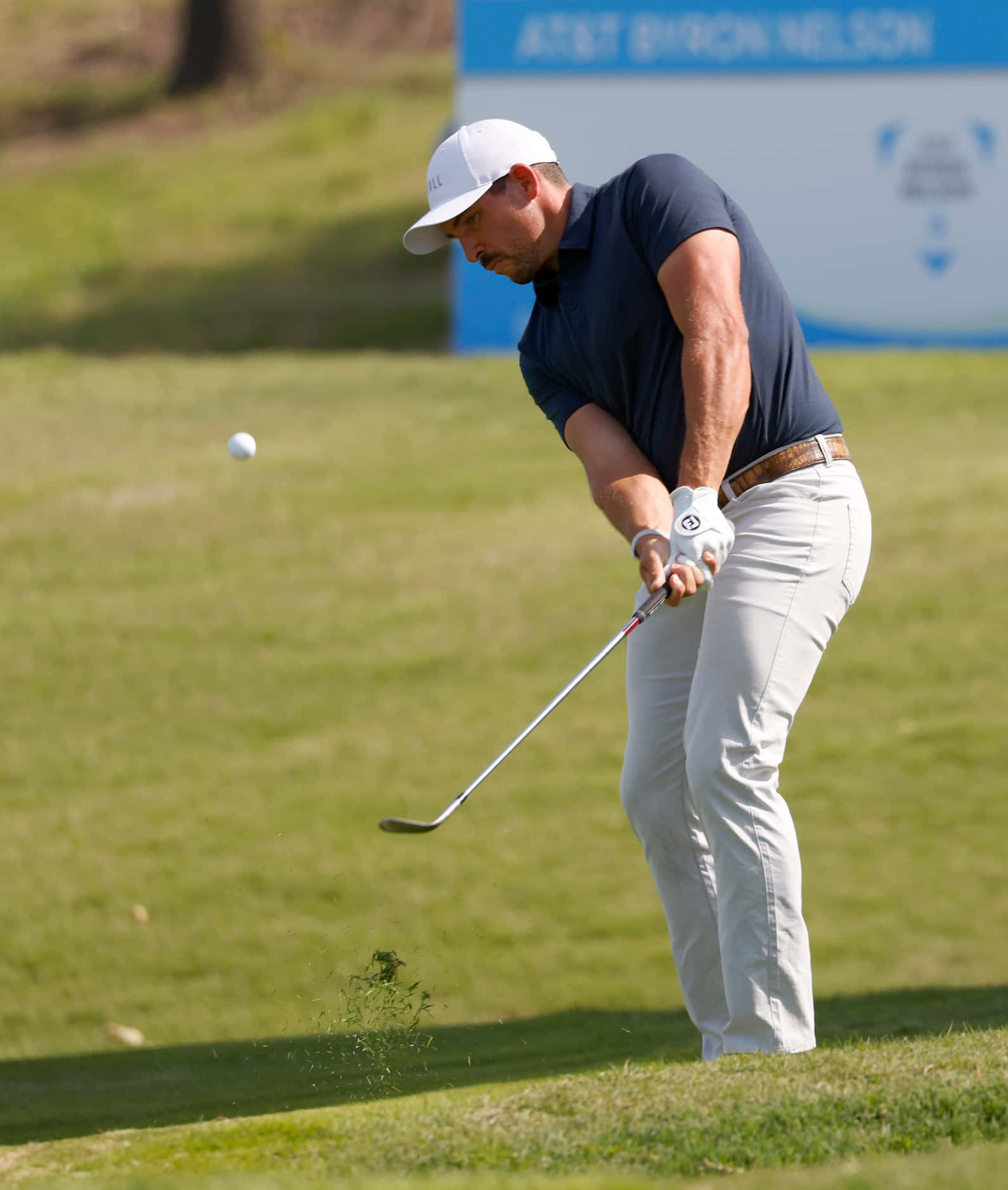 Scott Stallings hits on the green of the 14th hole during round 3 of the AT&T Byron Nelson ...
