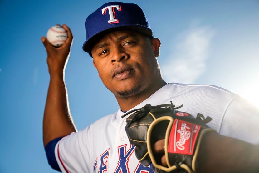 Texas Rangers pitcher Edinson Volquez poses for a photograph during spring training photo...