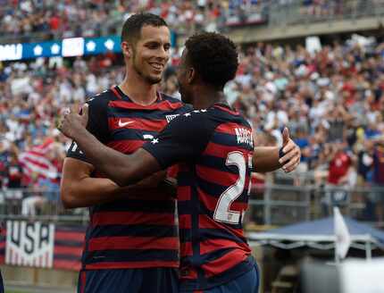 United States' Matt Hedges, left, and Kellyn Acosta, right, during an international friendly...