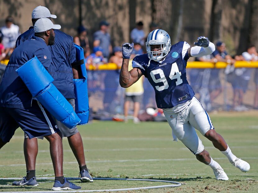 Cowboys defensive end Randy Gregory (94) runs a drill during an afternoon practice at...