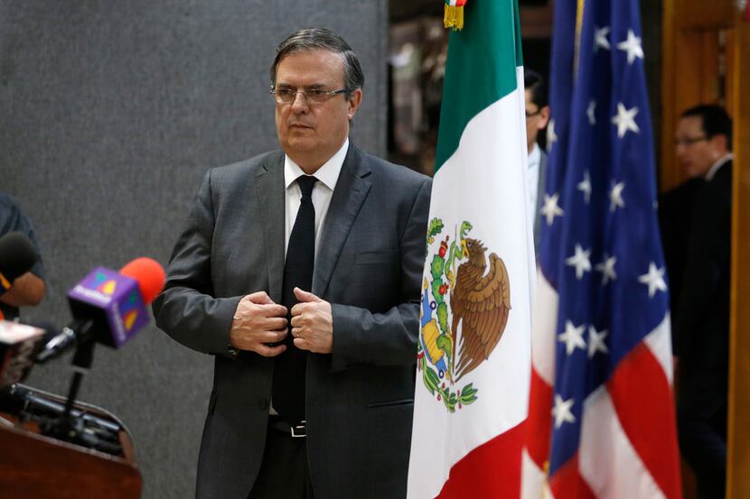 Mexico's Foreign Minister Marcelo Ebrard made his way to the lectern for a news conference...