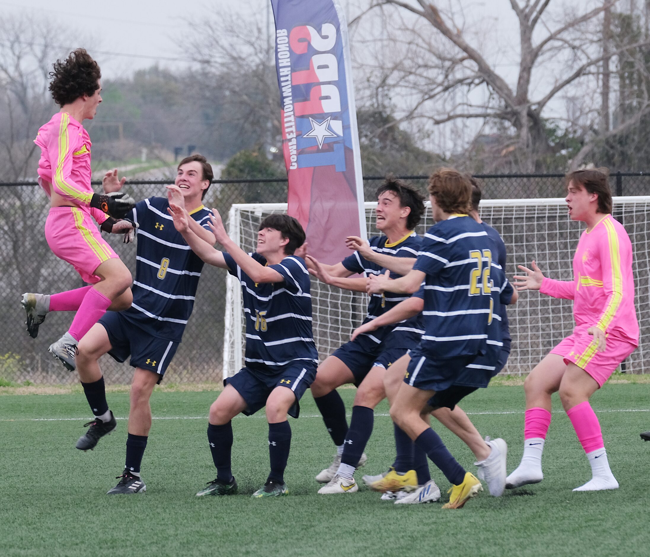 Prestonwood Christian goalkeeper Caleb Harris, left,  celebrates after the save to win...