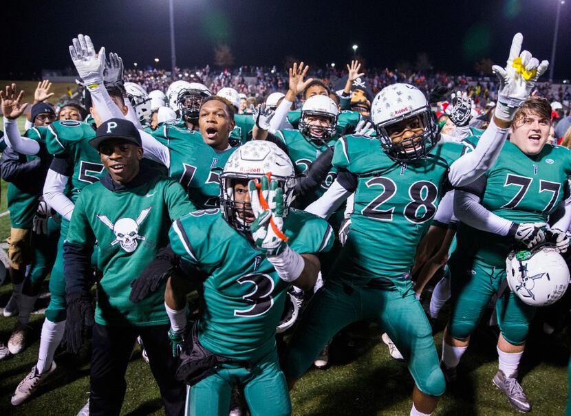 Mesquite Poteet celebrates a 34-27 win over Lancaster after their Class 5A, Division II...