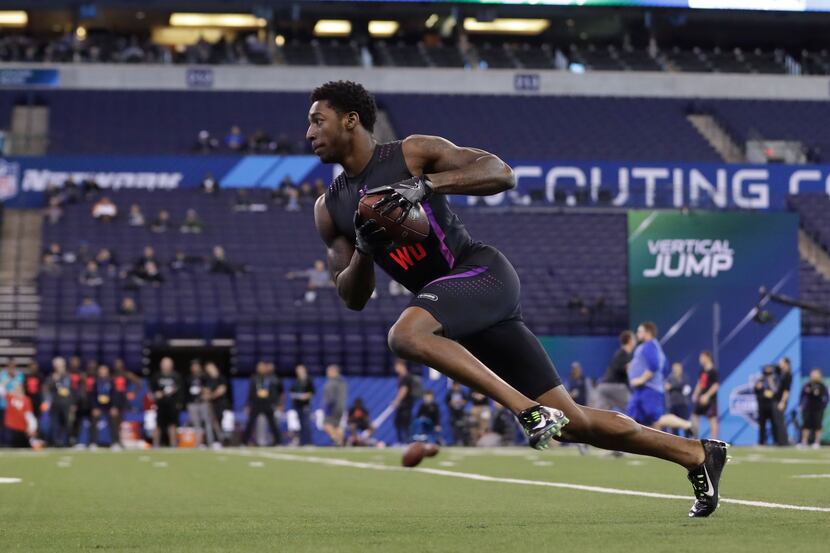 Alabama wide receiver Calvin Ridley runs a drill during the NFL scouting combine on...