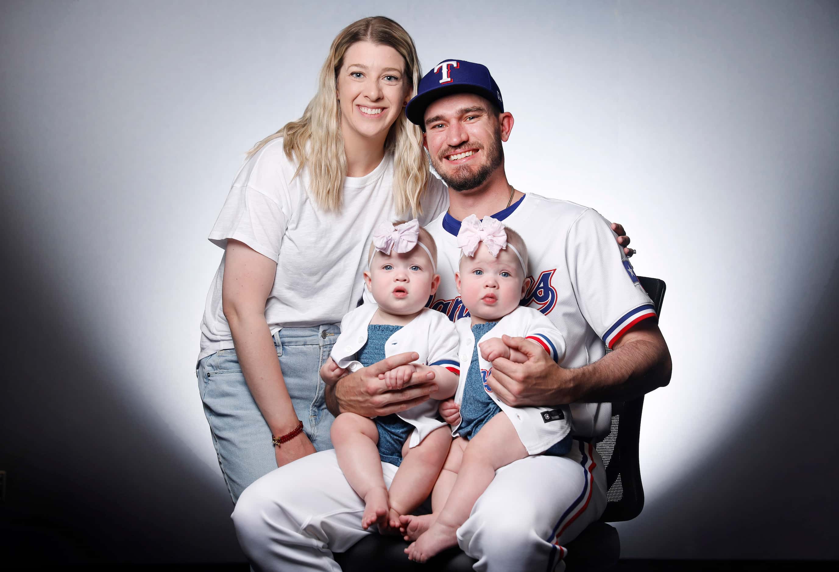Texas Rangers Andrew Heaney pictured with wife Jordan and newborn twin children Eleanor...