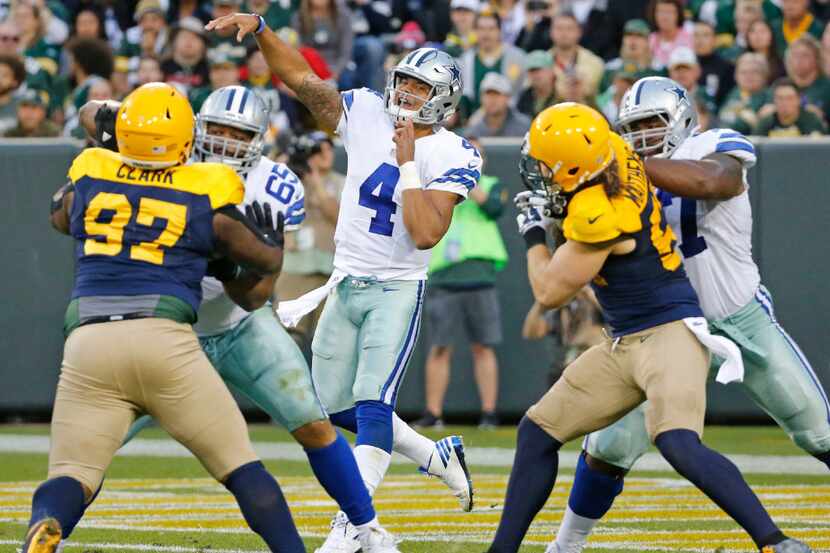 Dallas Cowboys quarterback Dak Prescott (4) throws a third-quarter pass during the Dallas...
