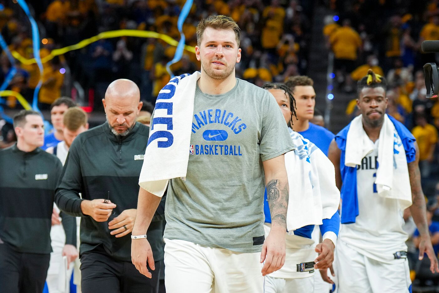 Dallas Mavericks guard Luka Doncic leaves the court after a loss to the Golden State...