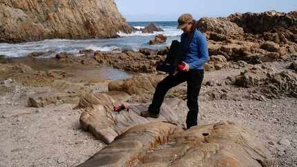 Naomi Cleghorn, an archaeologist at UT-Arlington, conducts an archaeological survey near...