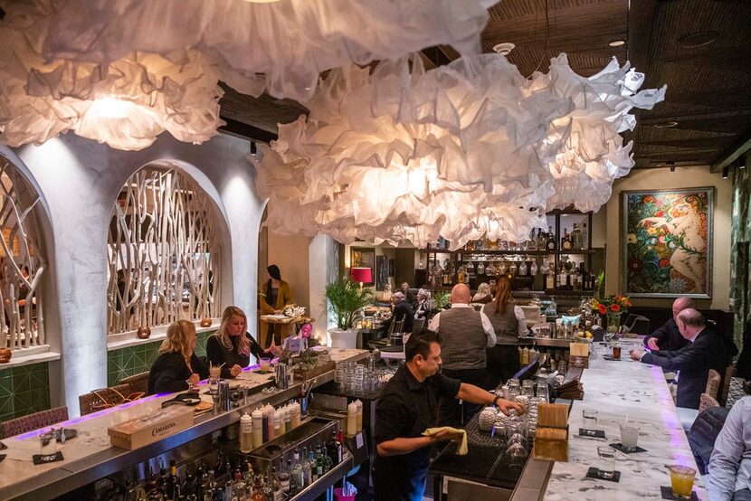 Floofy. That's how we'll describe those white thingies above the bar at Tulum.