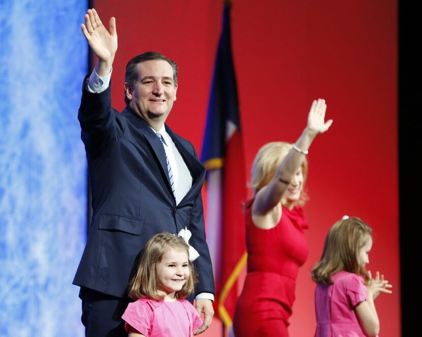  Sen. Ted Cruz waved to the crowd with wife Heidi and children Catherine and Caroline during...