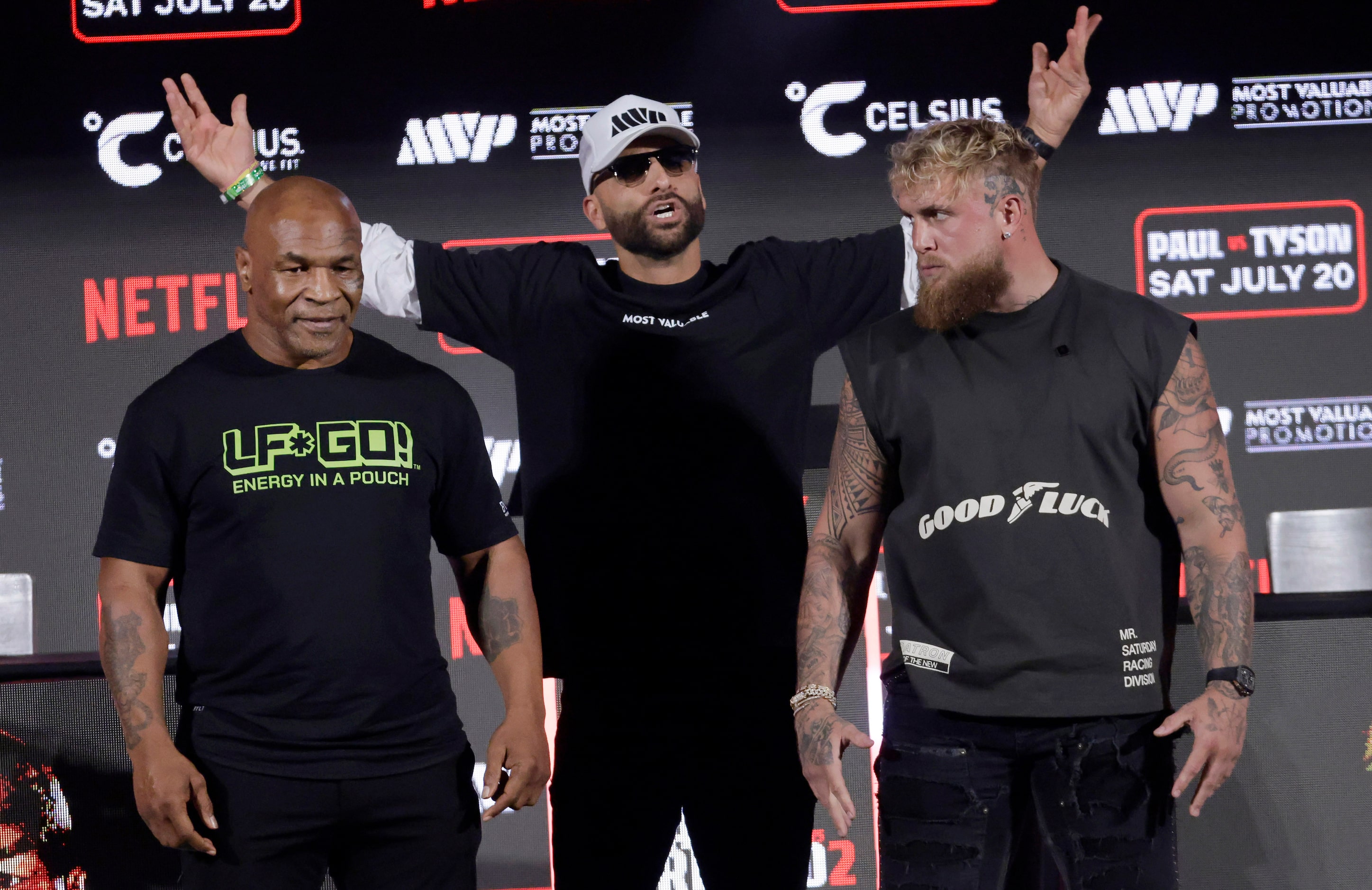 Ahead of their July fight at AT&T Stadium, boxers Mike Tyson (left) and Jake Paul pose for...