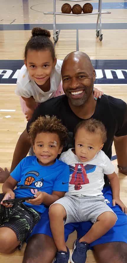 Mavs assistant coach Jamahl Mosley photographed with his children, 6-year-old daughter...