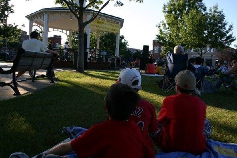 Edmund Tarantino, Chaz Tarantino and Topher Tarantino watch Domino Effect perform the Summer...