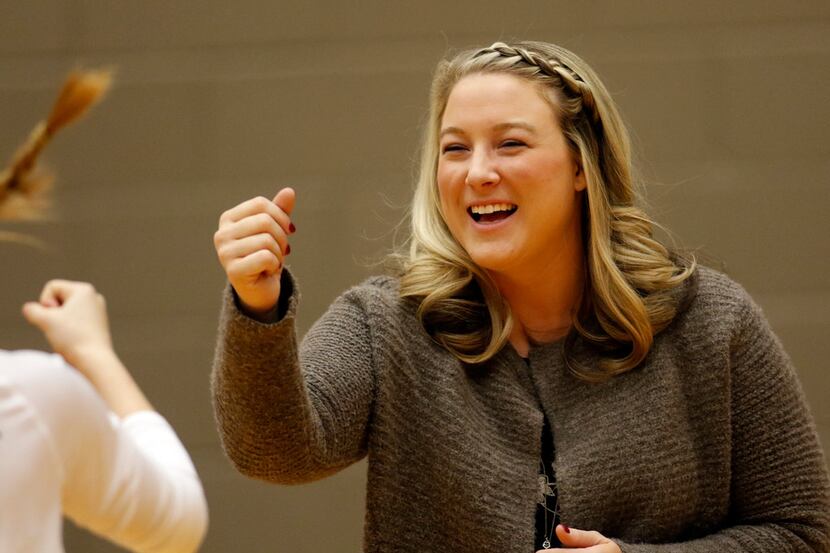 Trophy Club Byron Nelson coach Brianne Barker-Groth greets players from Denton Guyer prior...