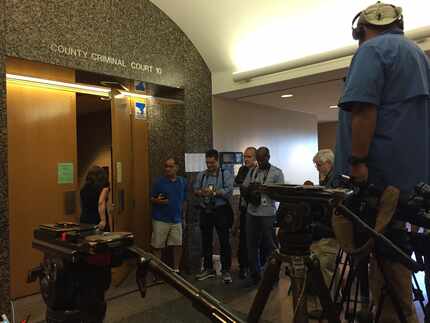 The media awaits the arrival of Johnny Manziel outside County Criminal Court 10 at the Frank...
