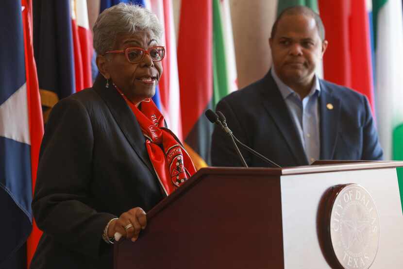 Board Chair of Dallas Housing Authority Betty Culbreath speaks next to Mayor Eric Johnson...