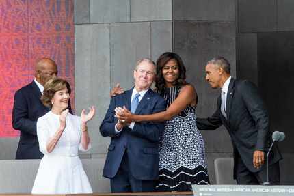 (L-R) Former US First Lady Laura Bush, former US President George W. Bush, First Lady...