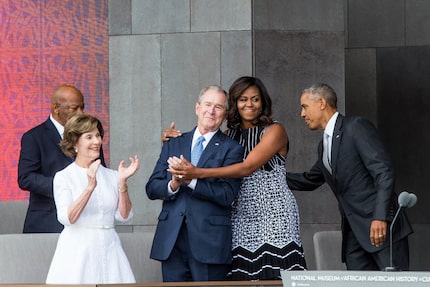 (L-R) Former US First Lady Laura Bush, former US President George W. Bush, First Lady...