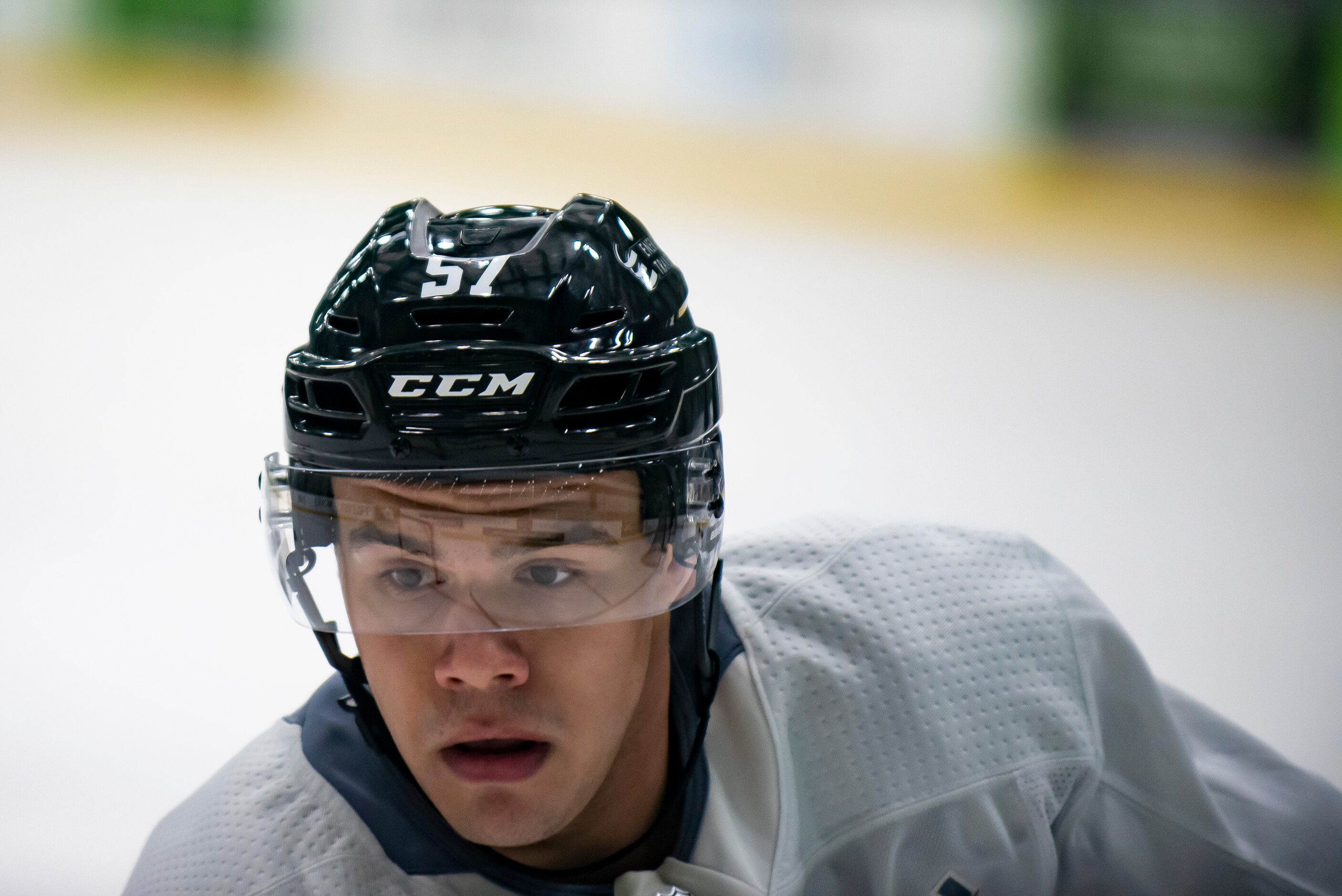 Forward Logan Stankoven (57) skates down the ice while going through a drill during the 2022...