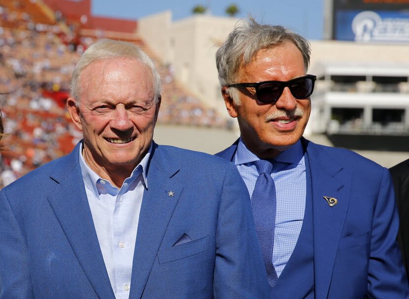 Dallas Cowboys owner Jerry Jones and Los Angeles Rams owner Stan Kroenke pose for photos...