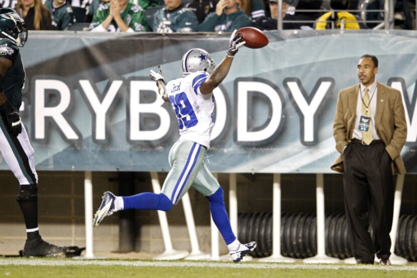Dallas Cowboys cornerback Brandon Carr (39) scores a touchdown off an interception in a game...