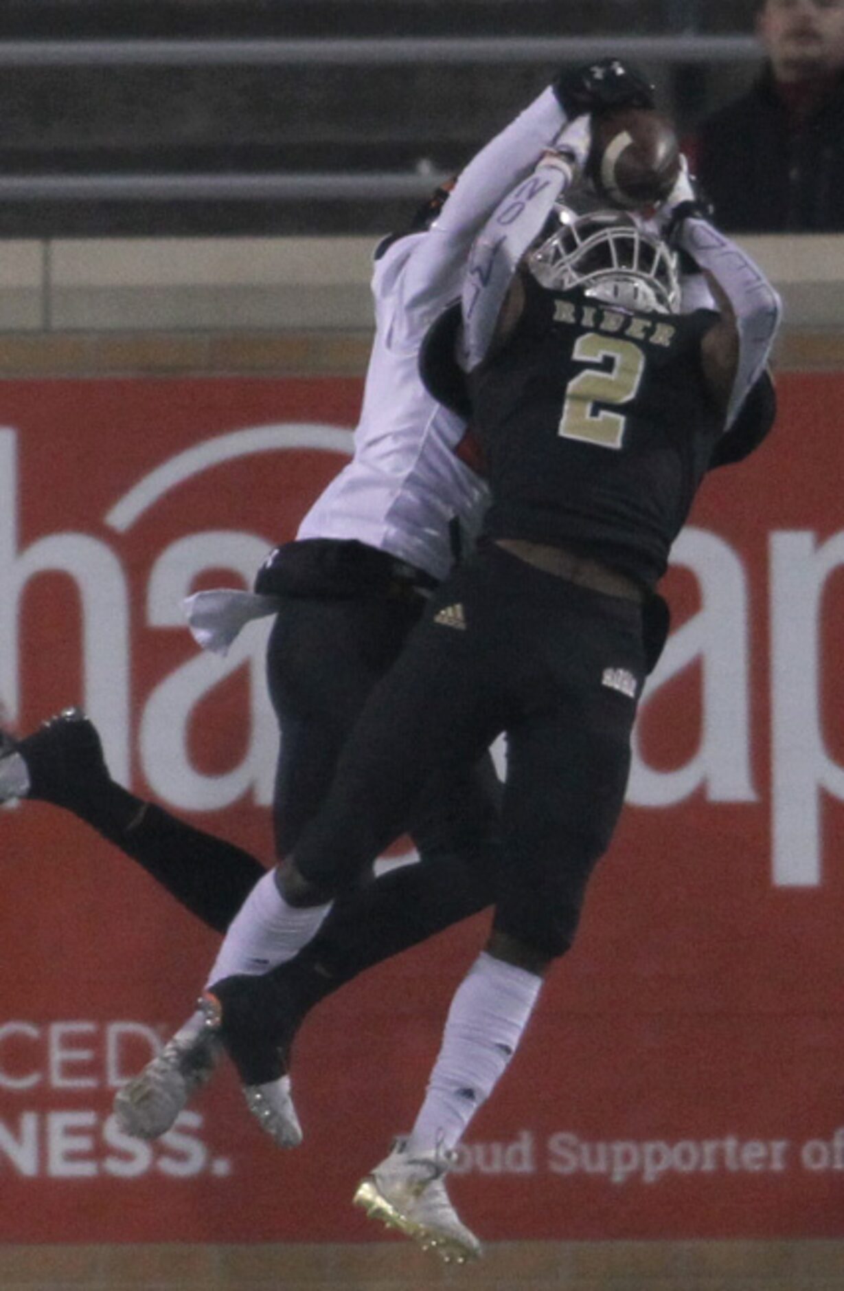 Aledo cornerback Jaden Allen (27) leaps to break up a pass intended for Wichita Falls Rider...