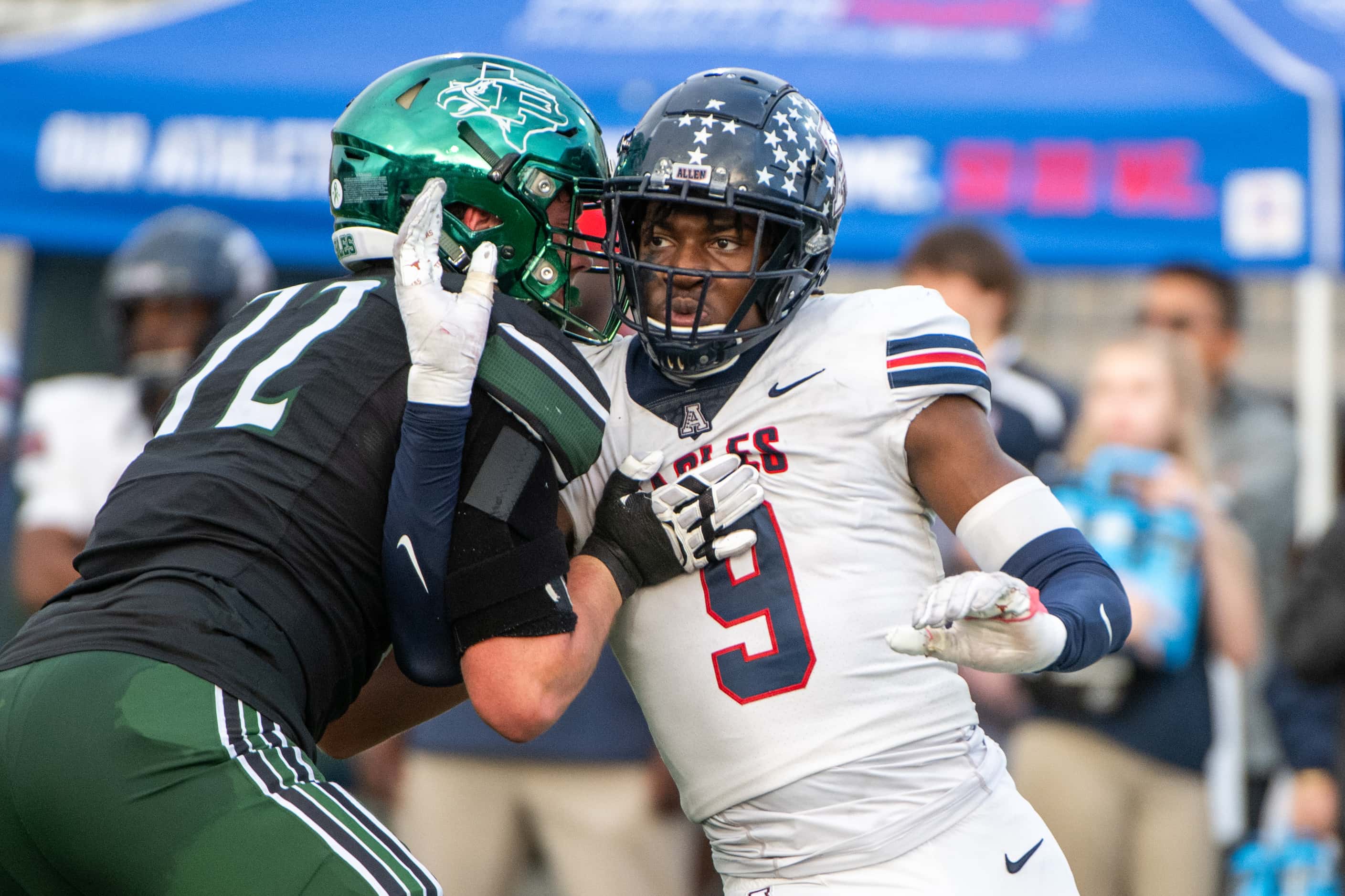 Allen's defensive end Zina Umeozulu (9) tries to get past Prosper's Logan Cahill (72) in the...