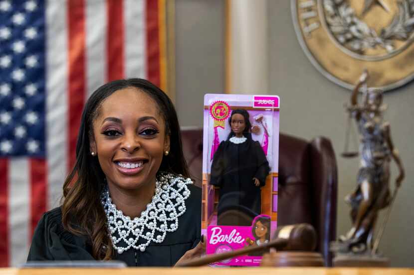 Dallas County Criminal Court Judge Shequitta Kelly poses for a portrait with a Judge Barbie...