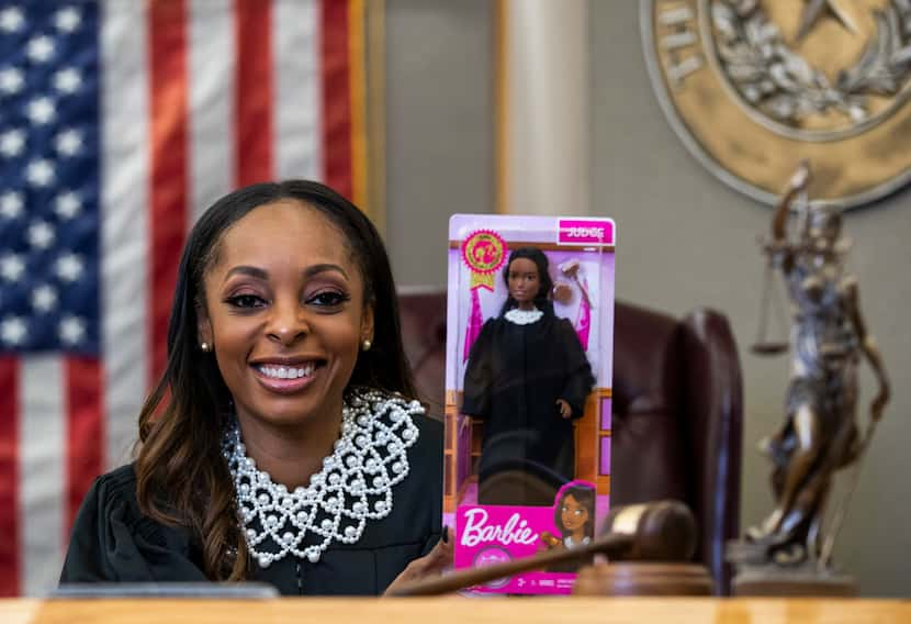 Dallas County Criminal Court Judge Shequitta Kelly poses for a portrait with a Judge Barbie...