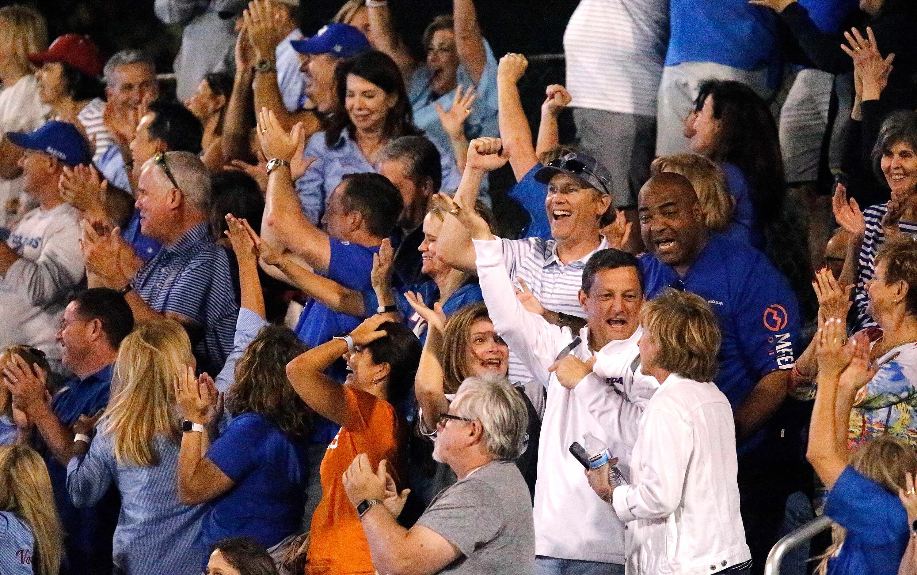 Trinity Christian Academy fans cheer a touchdown during the first half ast Prestonwood...