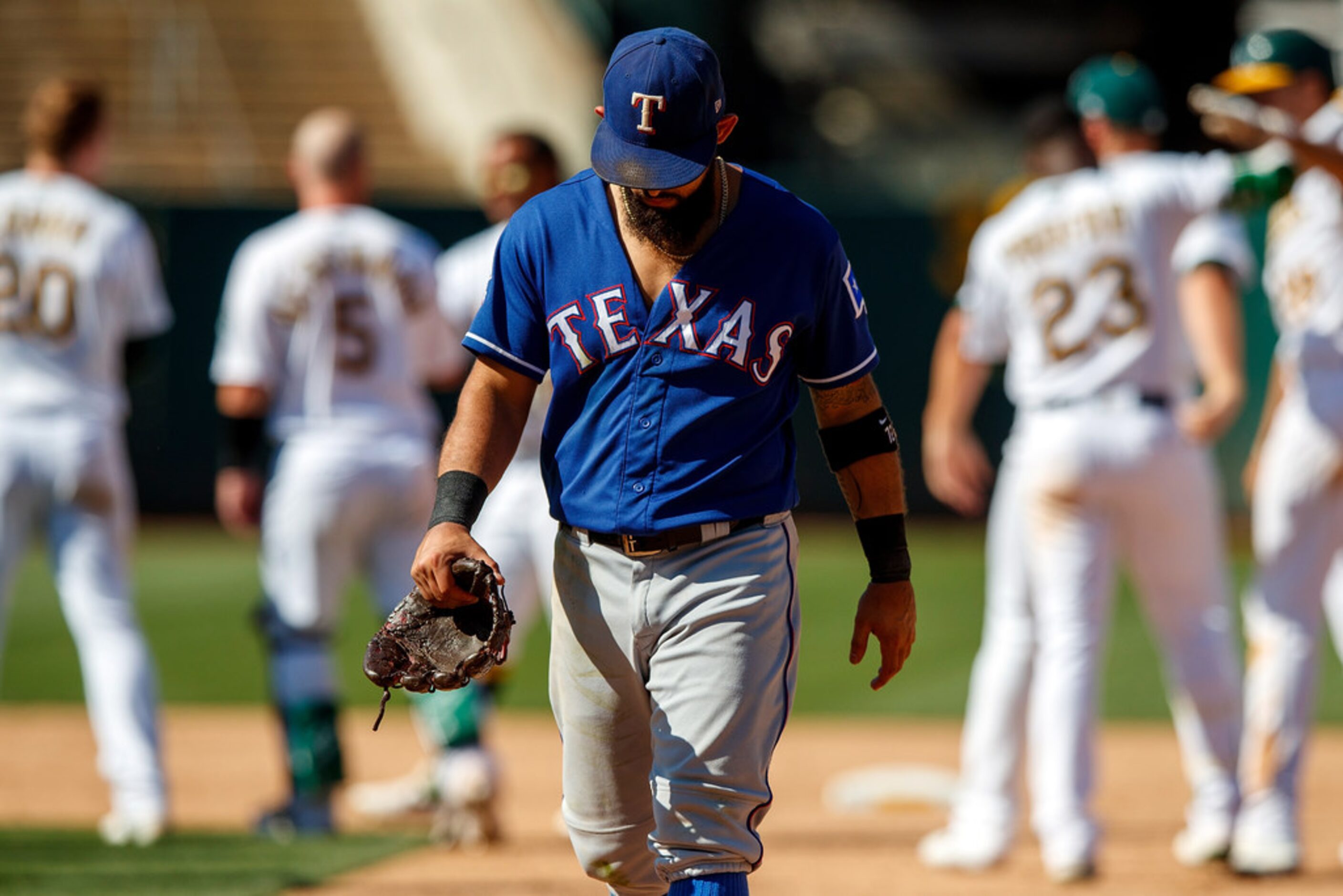 OAKLAND, CA - JULY 28:  Rougned Odor #12 of the Texas Rangers leaves the field after the...