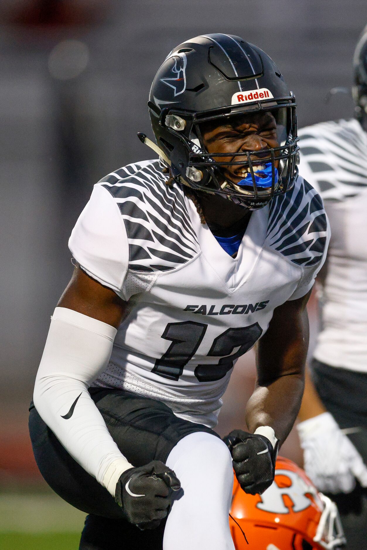 North Forney’s Jaylen Grey (13) celebrates after a tackle during the first half of a...