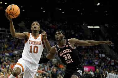 Texas guard Sir'Jabari Rice (10) gets past Oklahoma State forward Moussa Cisse (33) to put...