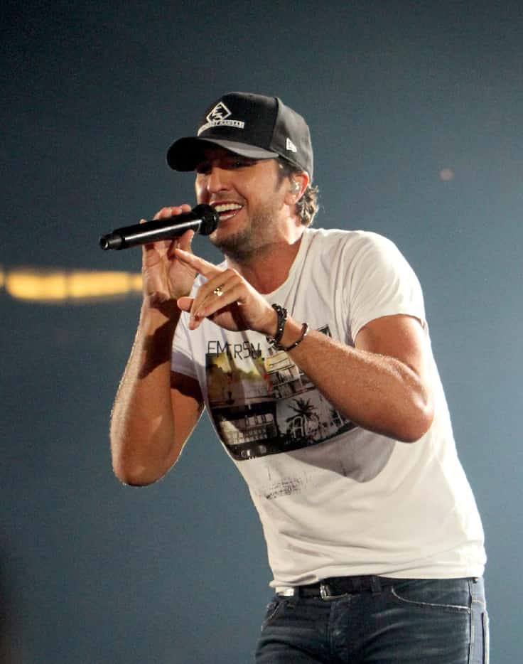 Luke Bryan performs before a capacity crowd of energetic fans. The "Kill All The Lights "...