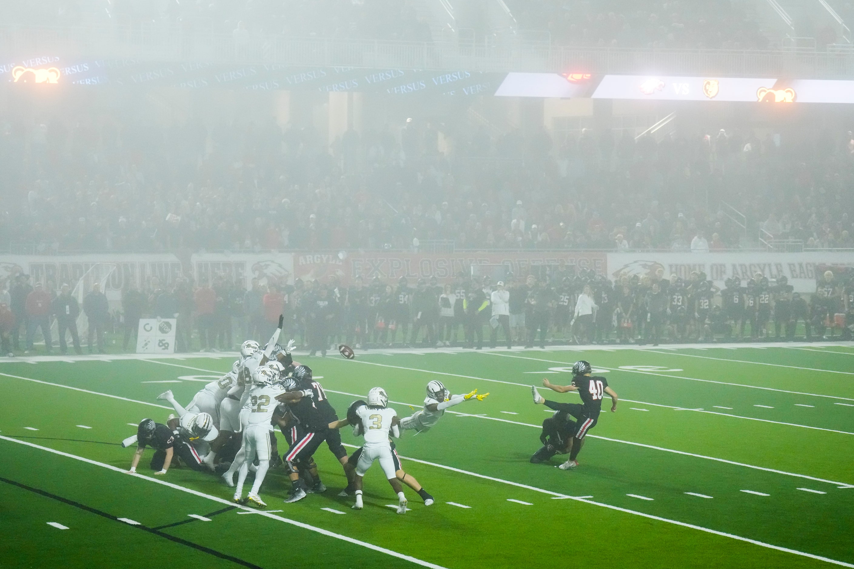 Argyle kicker Carter Buxton (40) connects on a field goal during the second half of a Class...