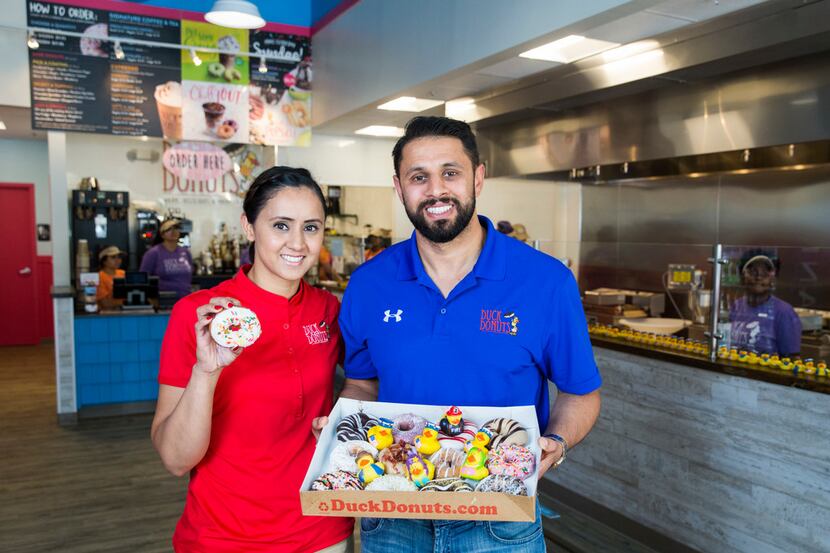 Store Manager Sunny Bassi (left) will operate Duck Donuts in Addison for owner Dr. Gary...