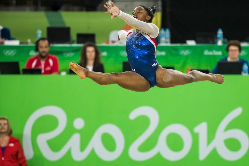 Simone Biles of the United States competes on the floor exercise during the women's...