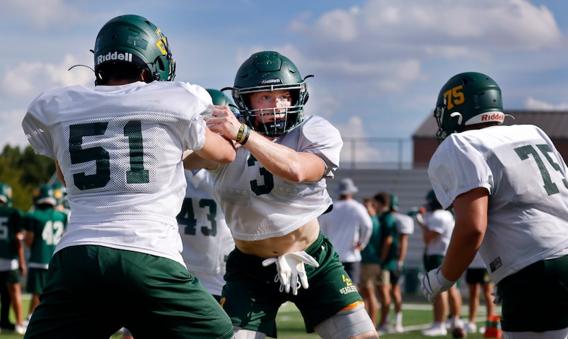 Frisco Legacy Christian Academy defensive end/tight end Tres Harris (3) pushes off a...