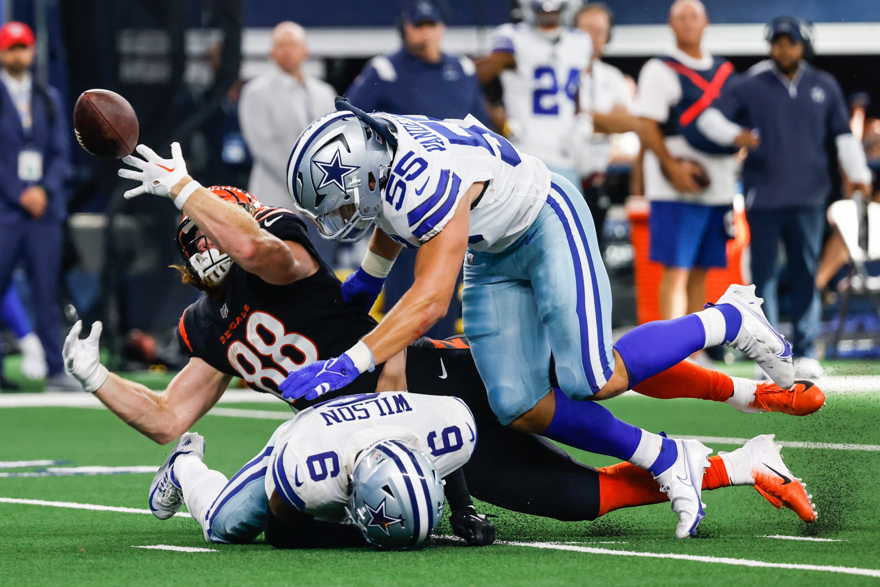 Cincinnati Bengals tight end Hayden Hurst (88) loses a pass between Dallas Cowboys...