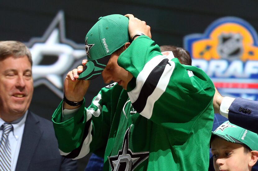 SUNRISE, FL - JUNE 26:  Denis Gurianov poses after being selected 12th overall by the Dallas...