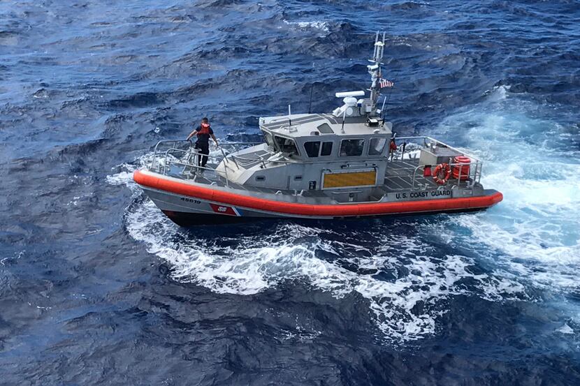 A U.S. Coast Guard Response Boat-Medium boat crew from Coast Guard Station Honolulu searched...