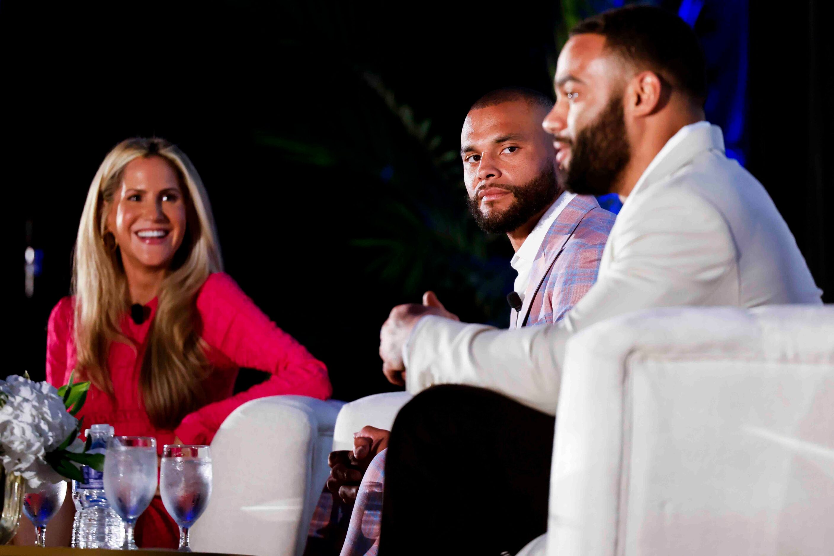 Moderator Andy Adler of CBS 11 (left), Cowboys QB Dak Prescott (center) listen to Solomon...