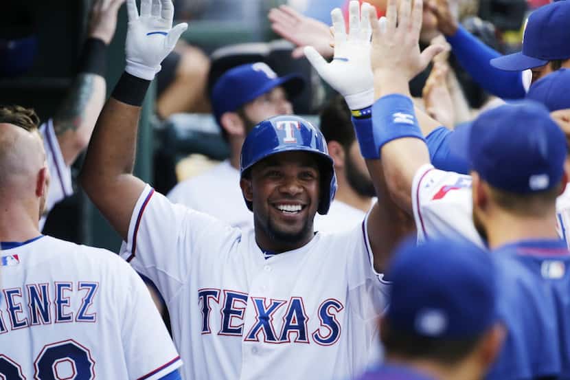 Texas Rangers shortstop Elvis Andrus (1) celebrates his two-run home run at Globe Life...