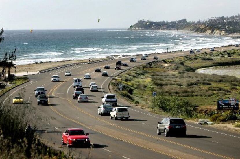 Motorists drive along California's Historic Highway 101 as it passes through...